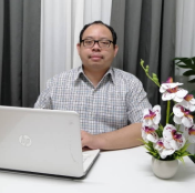 hanif-and-laptop-e1630341417199